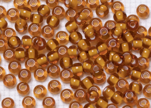 Бисер Чехия круглый 10/0 50 г 15096 темный янтарный, белая линия внутри